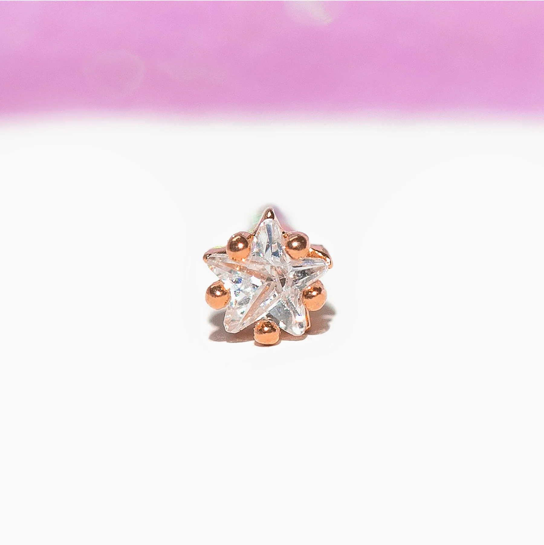 Teeniest & Brightest Star Piercing Style Earring - Image 5