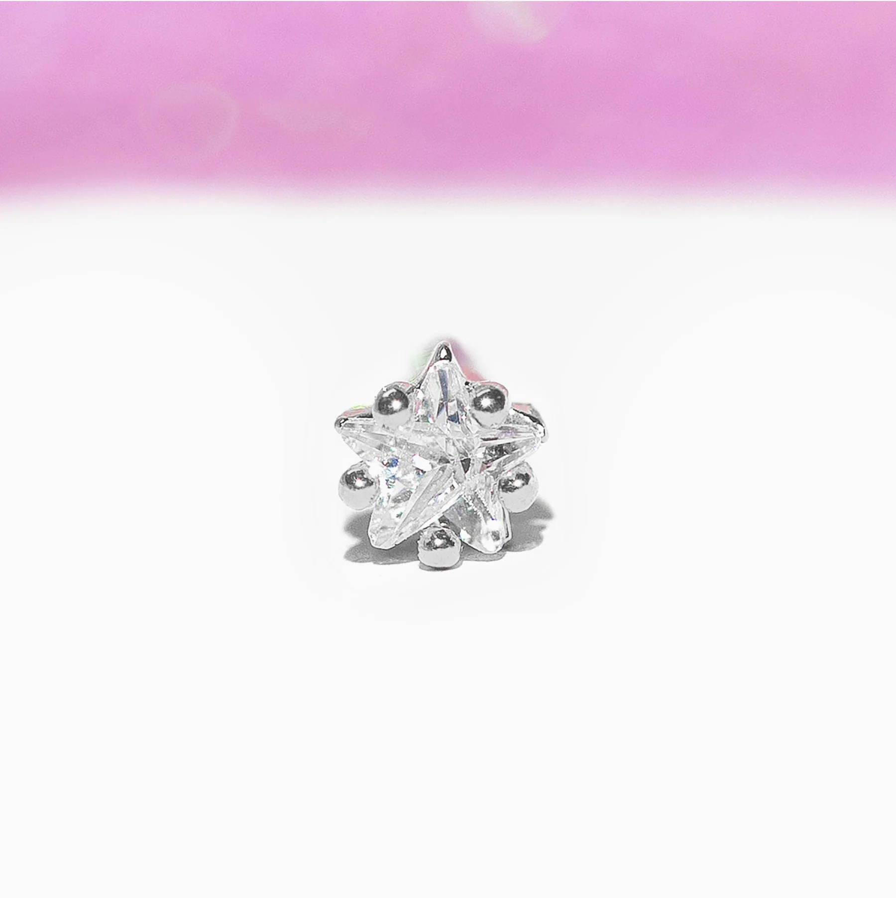 Teeniest & Brightest Star Piercing Style Earring - Image 6